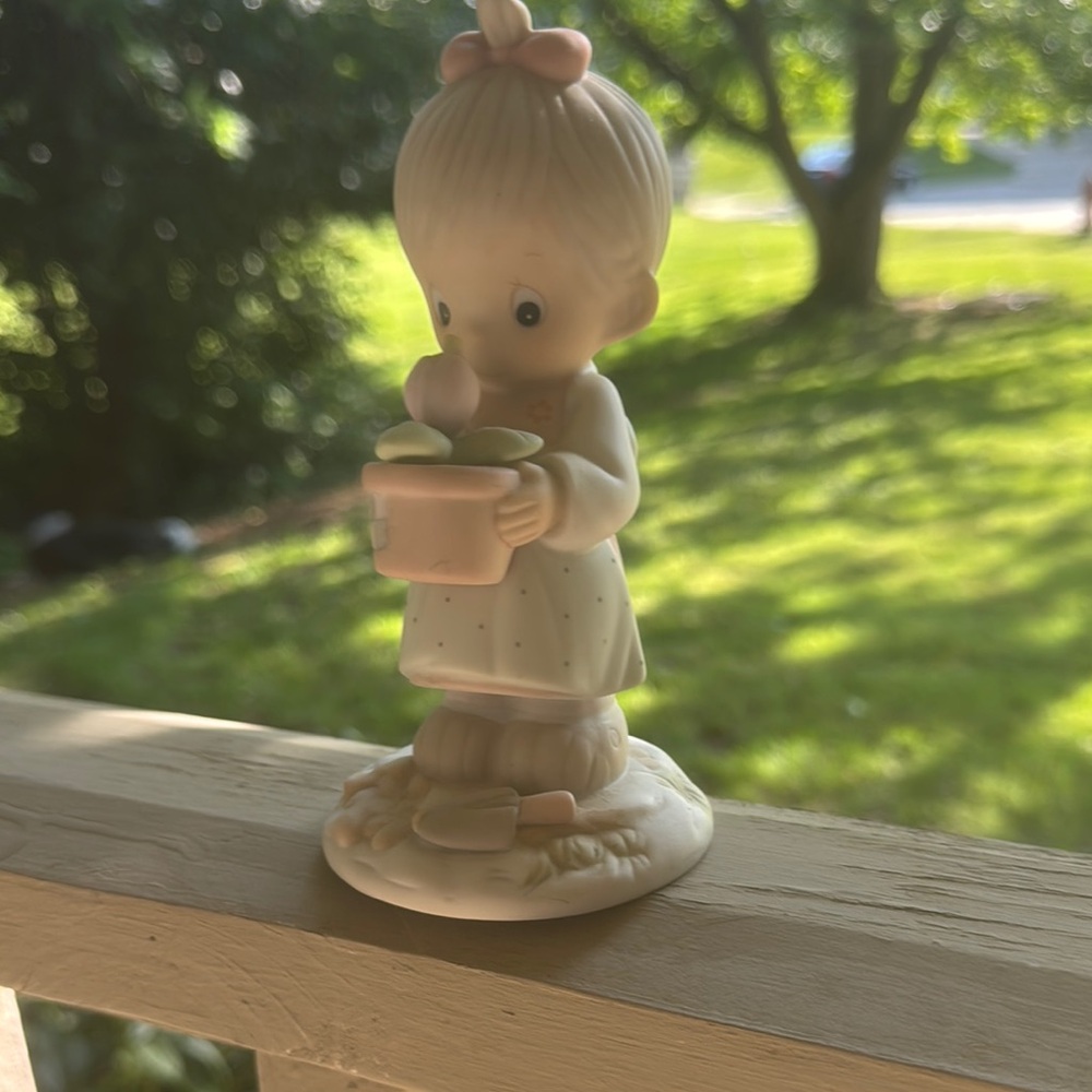 Precious Moments Figurine with Pink and White Accents